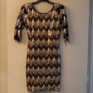 Black and gold sequined dress